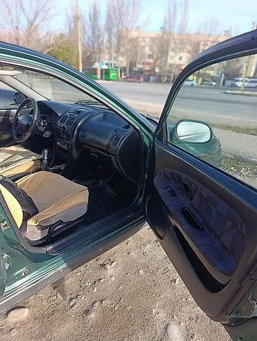 авто рага: Mitsubishi Carisma: 2000 г., 1.6 л, Кол менен иштөөчү, Бензин, Хетчбек — 7