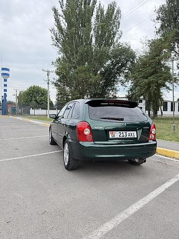 mistra: Mazda 323: 2003 г., 1.6 л, Автомат, Бензин, Универсал — 8