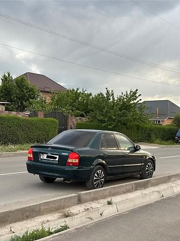 мазду: Mazda 323: 2000 г., 1.3 л, Механика, Бензин, Седан — 3