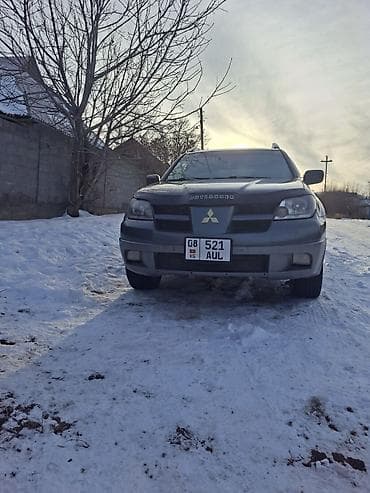 кулиса спейс стар: Mitsubishi Outlander: 2003 г., 2 л, Механика, Бензин, Кроссовер — 4