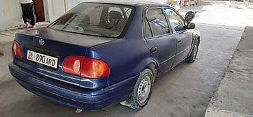 Транспорт: Toyota Corolla: 1995 г., Кол менен иштөөчү, Седан — 2