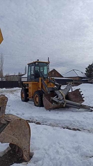 ом 605: Погрузчик, 2013 г., Колесный, Фронтальный — 2