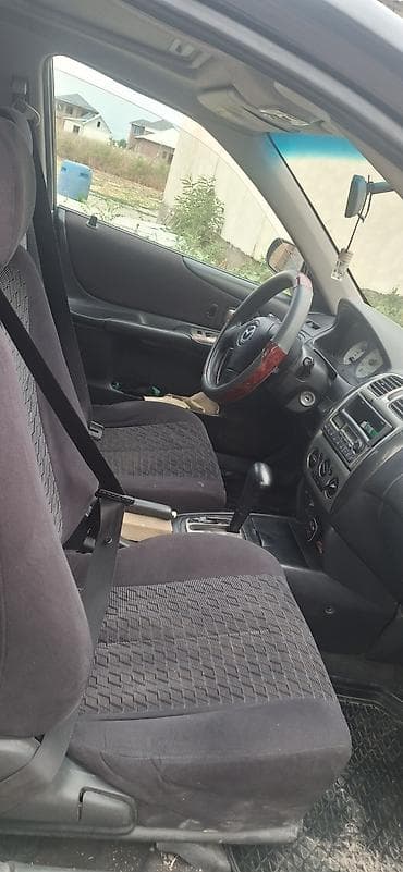 familia: Mazda Familia: 2001 г., Автомат, Бензин, Седан — 4