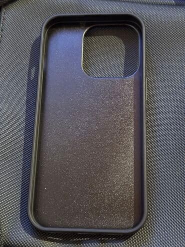 Аудиотехника: Кожаный чехол на Айфон 14 про. Продаю так как чехол не понравился! — 2