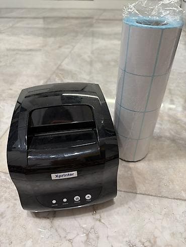 Термопринтер этикеток Xprinter с рулоном самоклеящихся этикеток