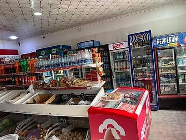 Недвижимость: Иштеп турган продуктовый магазин арендага берилет. Товары примерно — 5