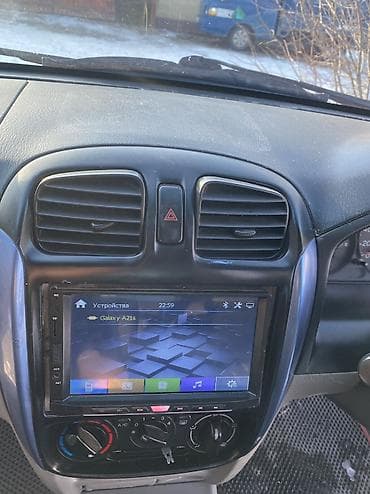 gac aion v: Mazda Demio: 2001 г., 1.3 л, Автомат, Бензин, Универсал — 7