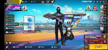 пижама кигуруми детская: Игровой персонаж из Free Fire в черном костюме с синими элементами — 2