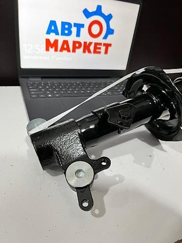 primera: Передний амортизатор Nissan 2007 г., Новый — 3