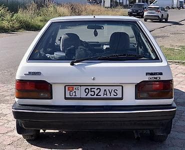 гц 8: Mazda 323: 1987 г., 1.5 л, Механика, Бензин, Хэтчбэк — 1