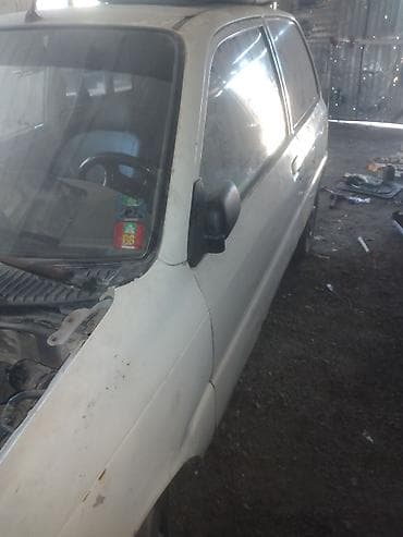 муравей с рулем: Daihatsu Cuore: 1995 г. — 9