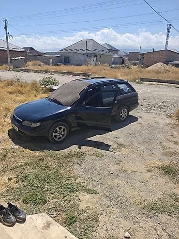 Mazda 323: 1998 г., 1.8 л, Механика, Бензин, Универсал