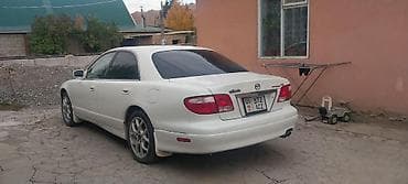 авто духи: Mazda Millenia: 2000 г., 2.5 л, Автомат, Бензин, Седан — 2