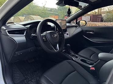 тае: Toyota Corolla: 2019 г., 1.8 л, Вариатор, Гибрид, Седан — 5