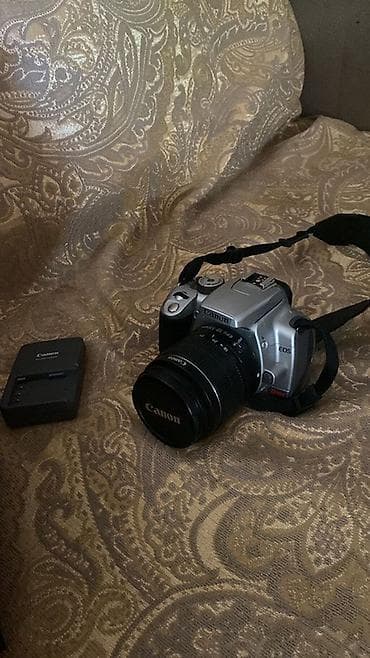 canon 40d: Зеркальная фотокамера Canon EOS (серебристый корпус) с комплектным — 1