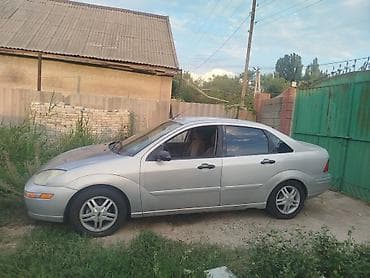желмаян с кабинкой: Ford Focus I (седан/хэтчбек) — интерьер и оснащение - Автоматическая — 10