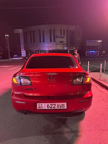 руль и педали: Mazda 3: 2006 г., Механика, Бензин, Седан — 1