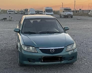 чанган уни к: Mazda 323: 2003 г., Автомат, Бензин, Универсал — 3