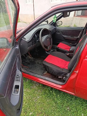 фотер: Daewoo Nexia: 2011 г., 1.5 л, Механика, Бензин, Седан — 4