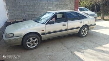 купить запчасти на опель вектра б: Mazda 626: 2024 г., 2 л, Механика, Бензиновая, Хэтчбэк — 1