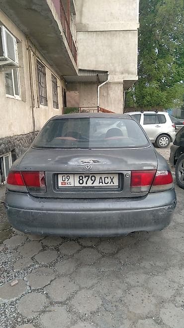 кронс: Mazda Cronos: 1992 г. — 4