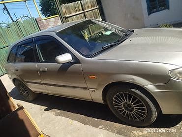 xc 90: Mazda 323: 2002 г., 1.6 л, Автомат, Бензин, Хэтчбэк — 4