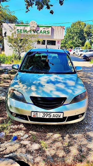 5: Mazda Demio: 2004 г., Автомат, Хэтчбэк — 7