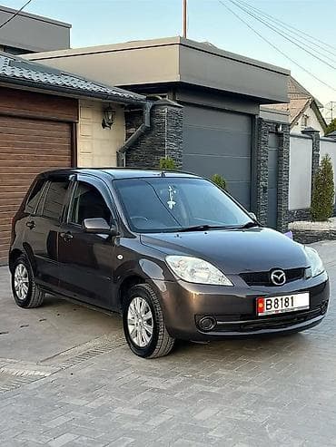 mazda 121: Mazda Demio: 2006 г., 1.3 л, Автомат, Бензин, Хэтчбэк — 1