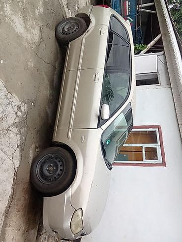Mazda 323: 2003 г., 1.6 л, Механика, Бензин, Хэтчбэк — 2