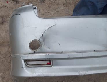 рейка на ипсум: Бампер 
Тайота Ипсун 2002
задний бампер с юбкой — 2