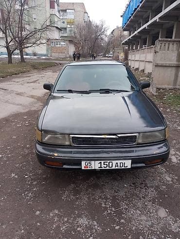 аудио системы: Nissan Maxima: 1990 г., Автомат, Бензин, Седан — 3