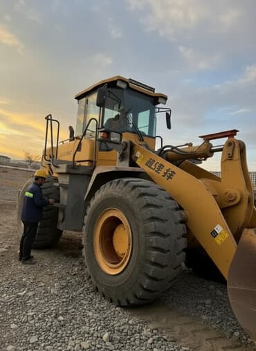 бетон миксер: Погрузчик, 2009 г., Колесный, Фронтальный — 1