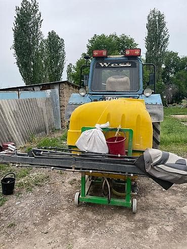 трактор куплю: Трактор «Беларус» с навесным опрыскивателем - Трактор колесный — 1