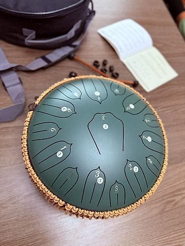 Гитаралар: Глюкофон - музыкальный инструмент, язычковый барабан — 1