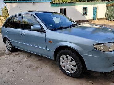 Mazda 323: 2000 г., 1.6 л, Автомат, Бензин, Хэтчбэк — 7