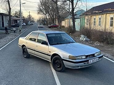 124 e500: Mazda 626: 1993 г., Седан — 1