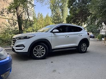 монгол ат: Hyundai Tucson, белый кроссовер 2.0 обьем Полный привод Американец — 2