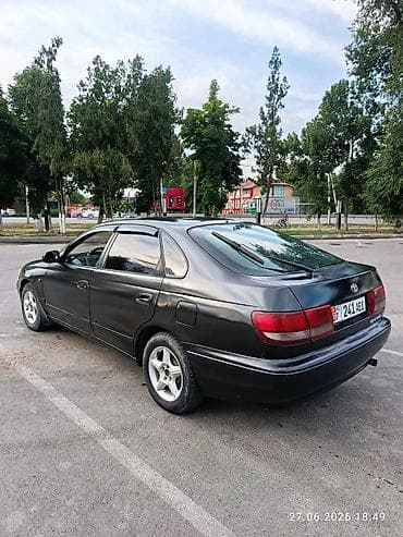 gac aion y plus: Toyota Carina E: 1995 г., 1.8 л, Механика, Бензин, Хэтчбэк — 1