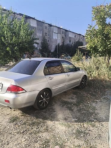 grand cherokee: Mitsubishi Lancer: 2007 г., 1.6 л, Автомат, Седан — 7