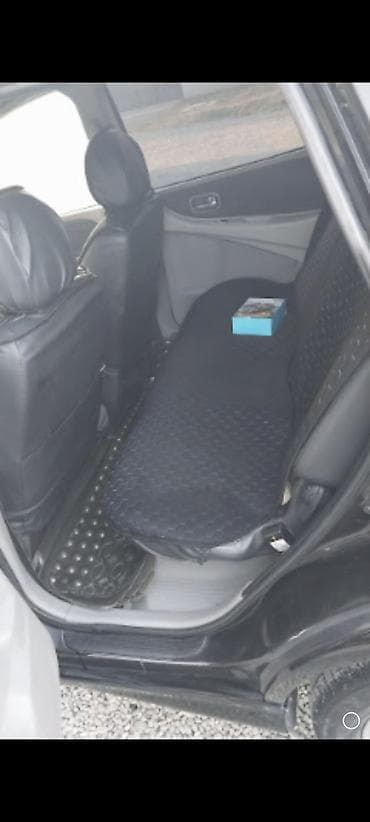 toyota corolla 2002: Nissan Tino: 2002 г., 1.8 л, Механика, Бензин, Фургон — 6