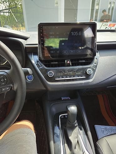 byd e2 2019: Toyota Corolla: 2021 г., 1.8 л, Вариатор, Гибрид, Седан — 5