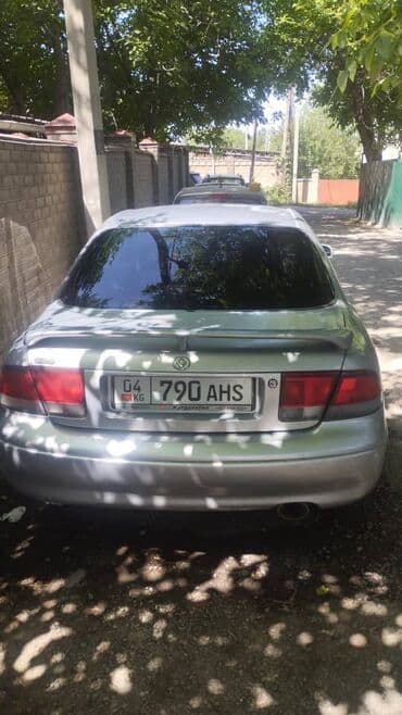 авто минивены: Mazda Cronos: 1992 г., 1.8 л, Механика, Бензиновая, Седан — 10