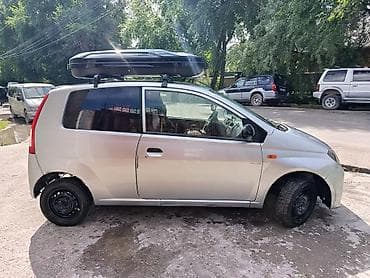 дайхатсу куеро: Daihatsu Cuore: 2005 г., 1 л, Механика, Бензин, Купе — 8