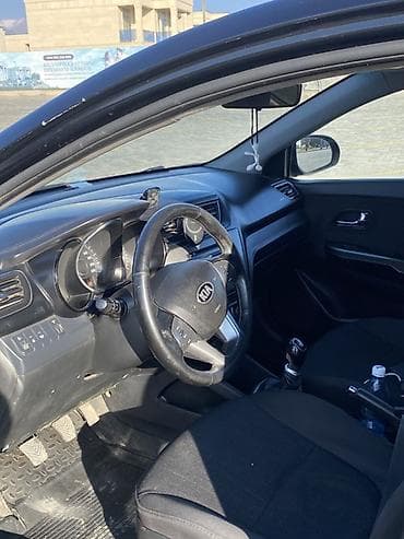 мото номер: Kia Rio: 2013 г., Механика, Седан — 3