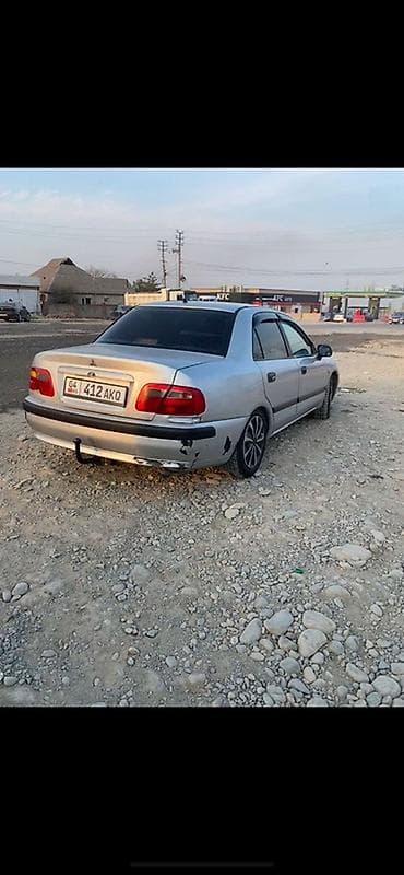 Mitsubishi Carisma: 2001 г., 1.8 л, Кол менен иштөөчү, Бензин, Седан — 3