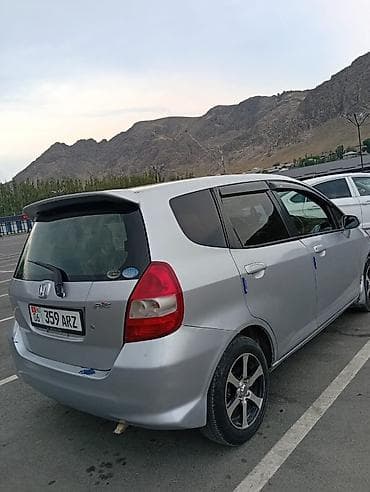 roewe er6: Honda Fit: 2002 г., 1.3 л, Автомат, Бензин, Хэтчбэк — 2