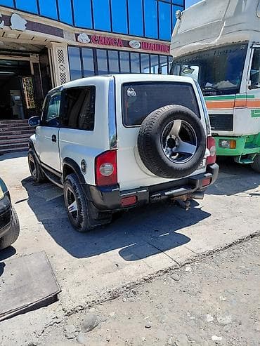 на корандо: Daewoo Korando: 1999 г., 2.3 л, Внедорожник — 4