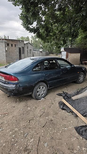 Унаа: Mazda 626: 1993 г., Хетчбек — 2