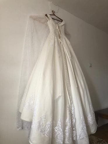 Прокат одежды: Свадебное платье (Италия) Цвет: Айвори. Фасон: Открытые плечи, есть — 6