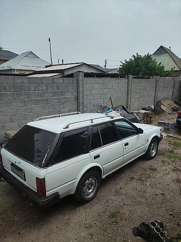 byd e5: Nissan Bluebird: 1988 г., 2 л, Механика, Универсал — 2